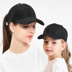 Parent-child matching set of black baseball caps with adjustable straps for sports