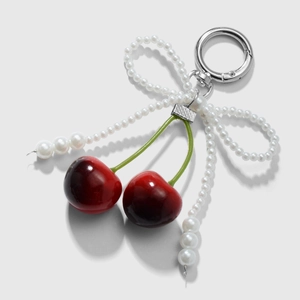 Exquisite cherry keychain with red fruit charms and a white pearl beaded bow ornament