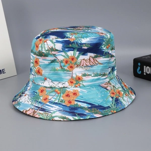 Reversible bucket hat with blue and orange tropical coconut tree and mountain print