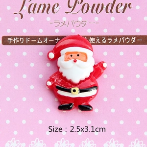 Detail showing a 2.5x3.1cm Santa Claus resin flatback ornament with classic red outfit