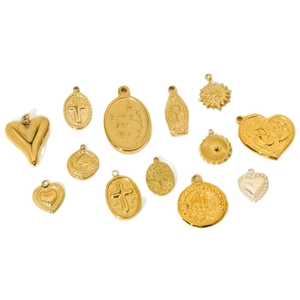 Set of 13 gold-plated stainless steel pendants with cross heart and sunburst designs