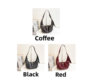 Three-color display of vintage leather crescent bags with gold studs and buckles