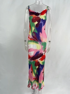 Macro detail of abstract floral printed pleated fabric on slim fit sleeveless dress