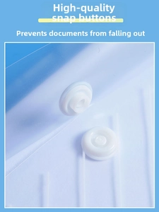Close-up of a white plastic snap button closure on a durable semi-transparent blue A4 folder