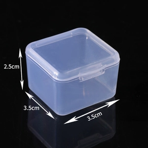 Detailed view of a 3.5x3.5x2.5cm clear plastic storage box with lid on black background