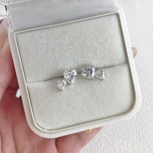 Exquisite silver heart stud earrings with sparkling zircons in a jewelry gift box