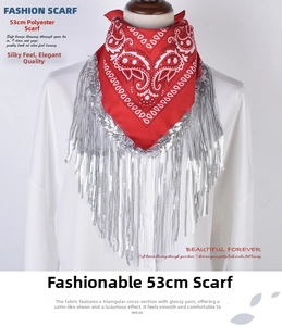 Red paisley bandana with silver sequin fringes displayed on a white shirt mannequin