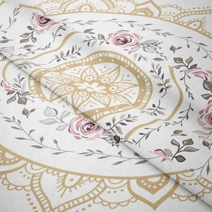 Detailed macro view of gold mandala pattern and pink rose on textile tapestry fabric