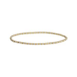 Detailed view of two-tone gold and silver stainless steel beads on elastic bracelet