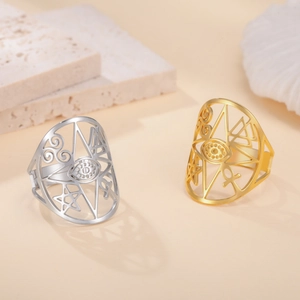 Silver and gold hollow stainless steel rings with mystic star and eye patterns