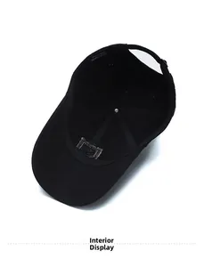 Detail view of the black cotton baseball cap interior showing seams and stitching