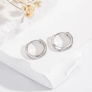 Minimalist silver hoop earrings with two rows of sparkling zircons for men and women