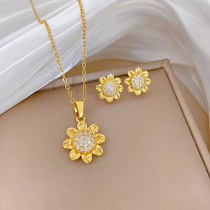 Elegant sunflower jewelry set with sparkling rhinestones on golden necklace and earrings