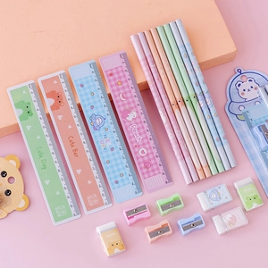Cartoon stationery set with pencils, rulers, and erasers in pastel macaron colors