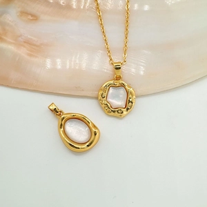 18K gold plated oval necklace with white mother of pearl and irregular geometric pendant