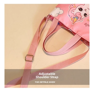 Close-up of adjustable pink shoulder strap with metal buckle on unicorn crossbody bag
