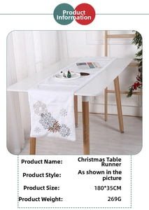Detailed view of white plush Christmas table runner with embroidered snowflakes 180x35cm