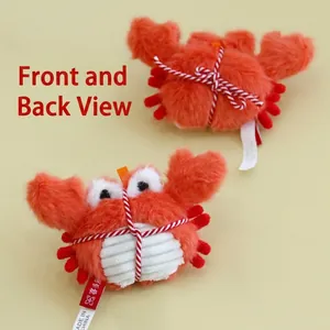 Catnip plush crab toy with cat bells and soft red fabric for kitten teeth cleaning