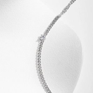 Elegant s925 silver Cuban link bracelet with a sparkling heart-shaped zirconia pendant