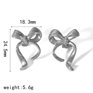 Detailed view of silver bow earrings showing dimensions 18.3mm width and 24.5mm height