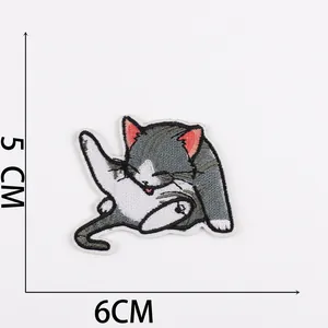 Detailed view of grey and white cat embroidery patch showing 5x6cm size and 2g weight