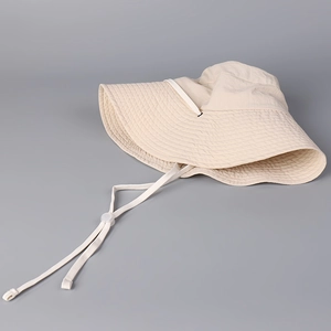 Minimalist beige quick-dry sun hat for women with wide brim and adjustable wind cord
