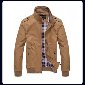 Detail of khaki casual bomber jacket featuring stand collar and classic plaid lining