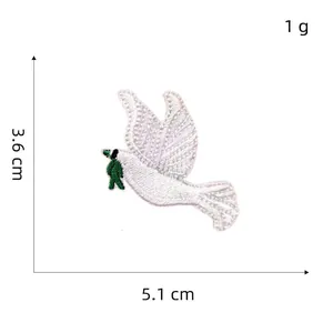 Detail showing white peace dove embroidery patch with dimensions 3.6cm by 5.1cm
