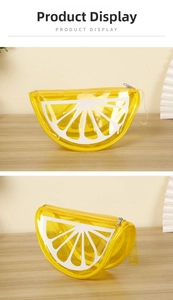 Detailed close-up showing the lemon-shaped PVC cosmetic bag and its secure zipper