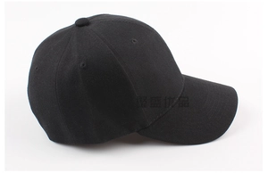 Detail of a black cotton baseball cap with curved brim and embroidered eyelets