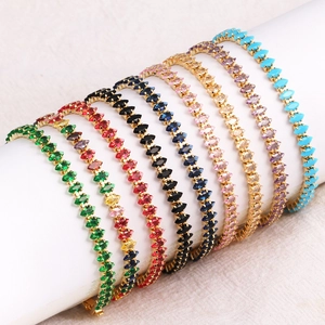 Detailed view of marquise-cut colorful zircon tennis bracelets with gold-plated settings