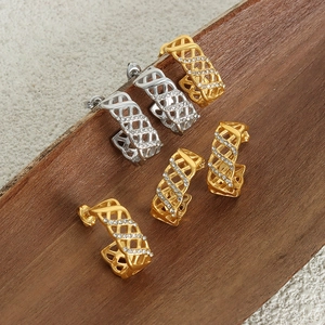 Vintage asymmetric C-shape hoop earrings with hollow lattice design and zircon inlays