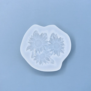 Detailed macro view of white sunflower silicone mold for DIY candles and resin art