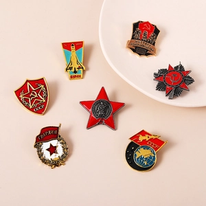 USSR theme metal enamel badges set with Red Star and CCCP symbols on a beige background
