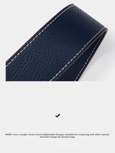 Detail view of 4cm wide navy blue lychee grain leather strap with white stitching