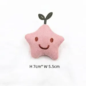 Pink star plush charm with green leaves and smile detail, size H 7cm by W 5.5cm