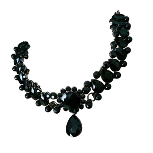 Vintage-style black crystal drop necklace with teardrop pendant on a white background