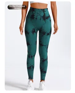 Detail of high waist seamless tie-dye yoga leggings with side pocket in black green