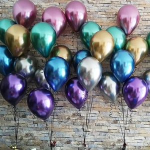Close-up of assorted metallic balloons in vibrant colors for party decorations