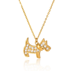 Close-up of golden Scottie dog pendant necklace with sparkling crystal rhinestones