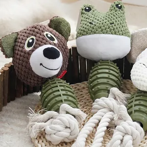 Durable TPR dog chew toy with cartoon bear design, rubber nubs and cotton rope knot