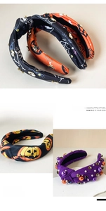 Detailed views of Halloween headbands with sequined pumpkins and spider web embroidery