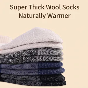 Thick merino wool hiking socks in multi-color stack showing warmth and knit texture