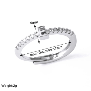 Detailed view of silver adjustable ring with letter E, 4mm height and 17mm inner diameter
