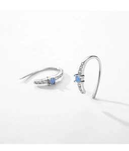 Detail view of S925 silver earrings with blue opal stone and micro-set cubic zirconia