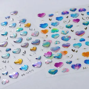 Detail view of M-555 3D heart nail art stickers with laser finish and star accents