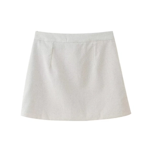 Detail view of the cotton linen A-line mini skirt with fine texture and subtle side seams