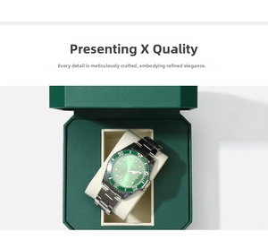 Detail view of a green dial mechanical watch inside its premium octagonal gift box