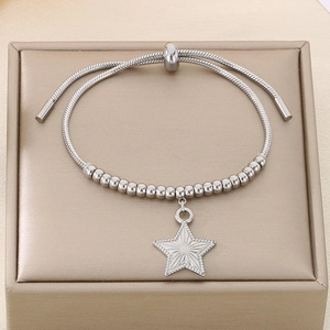 Detailed macro view of silver star charm and bead chain with adjustable sliding buckle