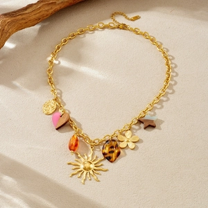 Bohemian gold sun pendant necklace with leopard heart and acrylic floral charms